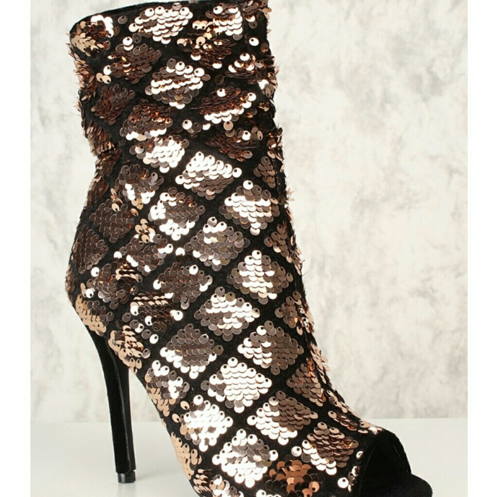 Glitter peep toes boots.